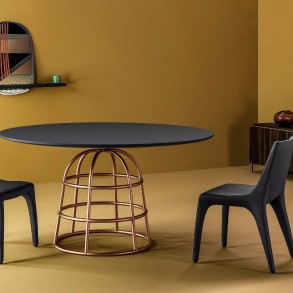 Gilles’s Modern Dining Tables Rest On Wireframe-style Metal Bases | #diningtables #diningroom #thediningroom #diningarea #diningareadesign #roomdesign #diningdesign #exclusivedesign #interiordesign #product design #luxurybrands @moderndiningtables