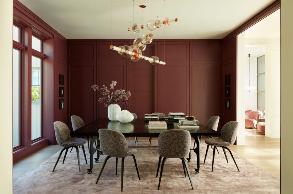 Meet a Modern Home With A Striking Pink Sculpture and a Purple Dining Room